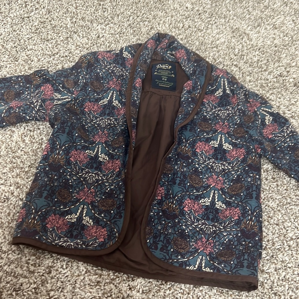 Brown an pink jacket